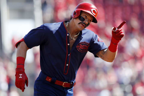 CINCINNATI, OH – MAY 05: Derek Dietrich #22 of the Cincinnati Reds reacts after hitting a solo home run, the team’s third straight, in the first inning against the San Francisco Giants at Great American Ball Park on May 5, 2019 in Cincinnati, Ohio. (Photo by Joe Robbins/Getty Images)