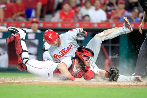 CINCINNATI, OH – JULY 26: Tucker Barnhart #16 of the Cincinnati Reds tags out Scott Kingery #4 of the Philadelphia Phillies at home plate in the fifth inning at Great American Ball Park on July 26, 2018 in Cincinnati, Ohio. (Photo by Andy Lyons/Getty Images)