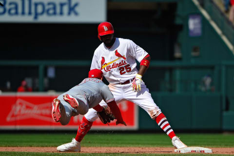 ST LOUIS, MO – APRIL 28: Jose Iglesias #4 of the Cincinnati Reds dives to tag out Dexter Fowler #25 of the St. Louis Cardinals who is back on second base during the eighth inning at Busch Stadium on April 28, 2019 in St Louis, Missouri. (Photo by Jeff Curry/Getty Images)