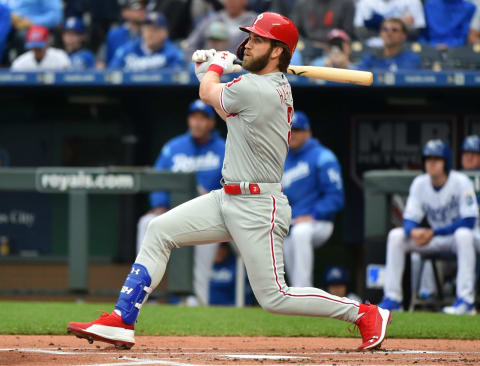 KANSAS CITY, MISSOURI – MAY 11: Bryce Harper #3 of the Philadelphia Phillies singles in the first inning against the Kansas City Royals at Kauffman Stadium on May 11, 2019 in Kansas City, Missouri. (Photo by Ed Zurga/Getty Images)