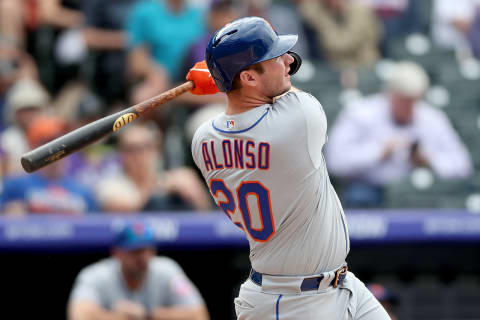 DENVER, COLORADO – SEPTEMBER 18: Pete Alonso #20 of the New York Mets hits a solo home run in the sixth inning against the Colorado Rockies at Coors Field on September 18, 2019 in Denver, Colorado. (Photo by Matthew Stockman/Getty Images)