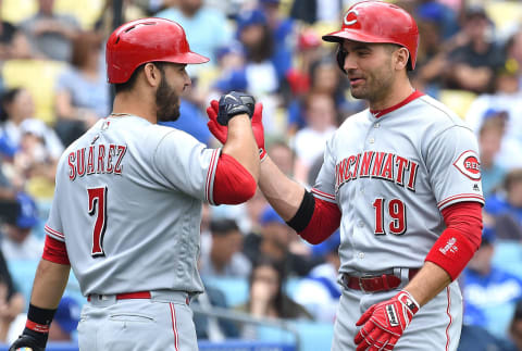 LOS ANGELES, CA – JUNE 11: Joey Votto #19 of the Cincinnati Reds is greeted by Eugenio Suarez #7 of the Cincinnati Reds (Photo by Jayne Kamin-Oncea/Getty Images)