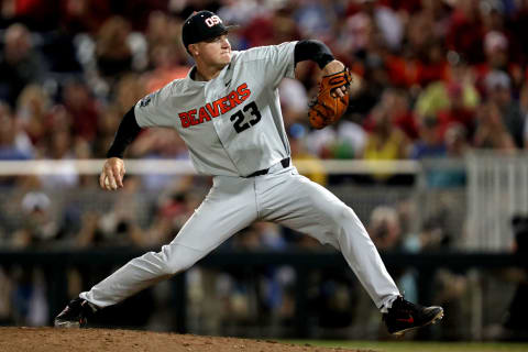 Jun 27, 2018; Omaha, NE, USA; Oregon State Beavers pitcher Kevin Abel (23) pitches during the eighth inning against the Arkansas Razorbacks in game two of the championship series of the College World Series at TD Ameritrade Park. Mandatory Credit: Bruce Thorson-USA TODAY Sports