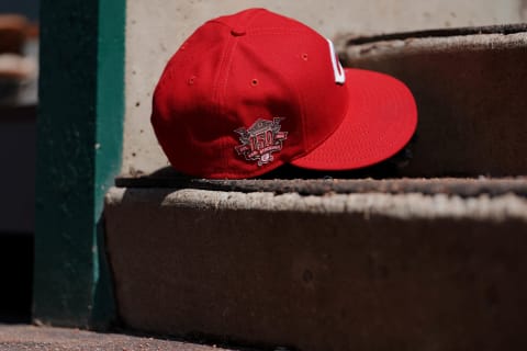 Apr 3, 2019; Cincinnati, OH, USA; A view of the 150th Anniversary patch on a Reds’ New Era baseball hat in the dugout. Mandatory Credit: Aaron Doster-USA TODAY Sports