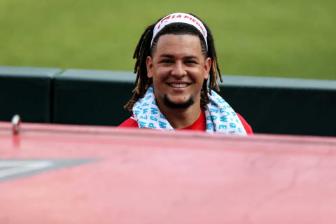 Cincinnati Reds starting pitcher Luis Castillo (58) smiles in the dugout.Cincinnati Reds Scrimmage July 15