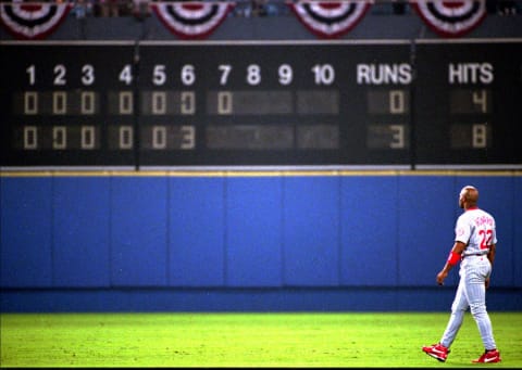 Oct. 13, 1995: Reds’ outfielder Thomas Howard checks the center field scoreboard as he walks out to his position. Cincinnati Enquirer Photo By Craig Ruttle