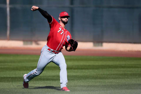 Cincinnati Reds pitcher Art Warren (77) warms up.