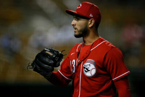 Cincinnati Reds relief pitcher Cionel Perez (43) returns to the dugout.