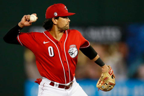 Cincinnati Reds shortstop Alex Blandino (0) plays a ground ball off the bat.