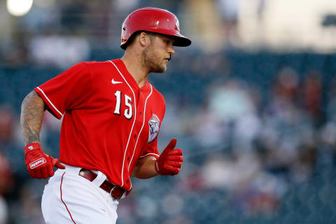 Cincinnati Reds center fielder Nick Senzel (15) rounds the bases on a solo home run in the first inning of the MLB Cactus League Spring Training game.