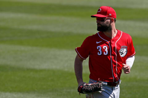 Cincinnati Reds left fielder Jesse Winker (33) runs in after the first inning.