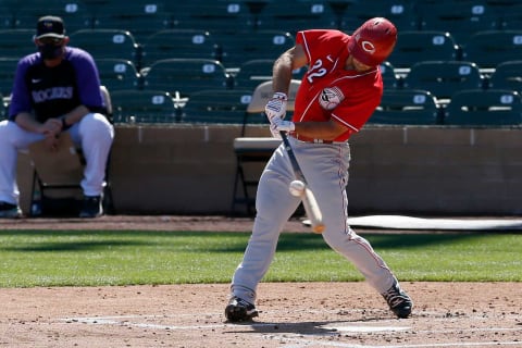 Cincinnati Reds Max Schrock (32) singles in the third inning of the MLB Cactus League Spring Training game.