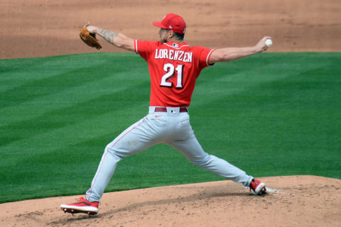 Mar 15, 2021; Tempe, Arizona, USA; Cincinnati Reds relief pitcher Michael Lorenzen (21) pitches. Mandatory Credit: Joe Camporeale-USA TODAY Sports