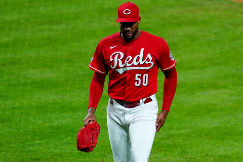 Cincinnati Reds relief pitcher Amir Garrett (50) walks to the dugout after surrendering a three-run home run.