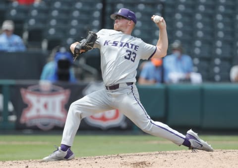 May 26, 2021; Oklahoma City, Oklahoma, USA; Kansas State pitcher Jordan Wicks (33) delivers a pitch. Mandatory Credit: Alonzo Adams-USA TODAY Sports