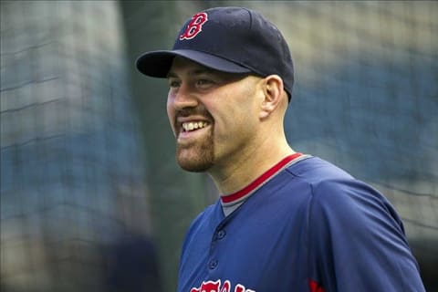 MLB: Boston Red Sox at Minnesota Twins Apr 23, 2012; Minneapolis, MN, USA: Boston Red Sox third baseman Kevin Youkilis (20) looks on during batting practice before a game against the Minnesota Twins at Target Field. Mandatory Credit: Jesse Johnson-US PRESSWIRE