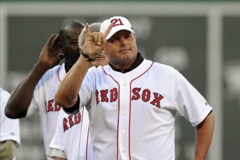 Jul 30, 2013; Boston, MA, USA; Former Boston Red Sox pitcher Roger Clemens acknowledges the fans during pre-game ceremonies prior to a game against the Seattle Mariners at Fenway Park. Mandatory Credit: Bob DeChiara-USA TODAY Sports