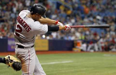 May 25, 2014; St. Petersburg, FL, USA; Boston Red Sox shortstop Xander Bogaerts (2) hits a 2-RBI single during the ninth inning against the Tampa Bay Rays at Tropicana Field. Tampa Bay Rays defeated the Boston Red Sox 8-5. Mandatory Credit: Kim Klement-USA TODAY Sports