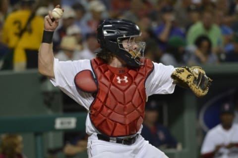 Mar 13, 2015; Fort Myers, FL, USA; Boston Red Sox catcher Ryan Hanigan (10) throws to third base during the third inning against the New York Yankees at JetBlue Park. Mandatory Credit: Tommy Gilligan-USA TODAY Sports