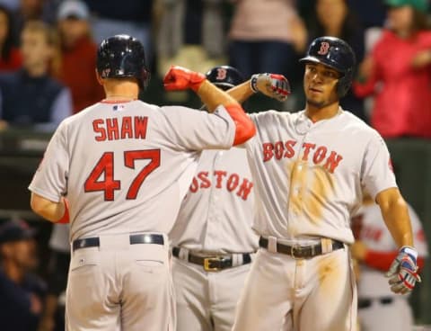 Aug 26, 2015; Chicago, IL, USA; Boston Red Sox first baseman Travis Shaw (47) celebrates with shortstop Xander Bogaerts (2) after hitting a two run home run during the eighth inning against the Chicago White Sox at U.S Cellular Field. The Boston Red Sox defeated the Chicago White Sox 2-0. Mandatory Credit: Caylor Arnold-USA TODAY Sports