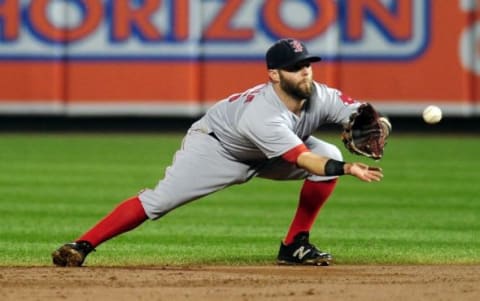 Sep 16, 2015; Baltimore, MD, USA; Boston Red Sox second baseman Dustin Pedroia (15) catches a line drive in the third inning against the Baltimore Orioles at Oriole Park at Camden Yards. Mandatory Credit: Evan Habeeb-USA TODAY Sports