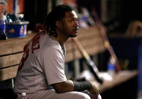 Aug 11, 2015; Miami, FL, USA; Boston Red Sox left fielder Hanley Ramirez in the dugout in the 10th inning of a game against the Miami Marlins at Marlins Park. The Marlins won 5-4. Mandatory Credit: Robert Mayer-USA TODAY Sports