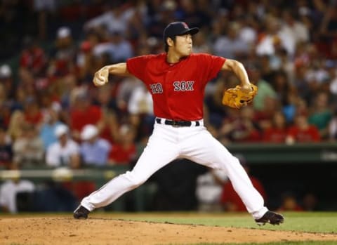 Jul 24, 2015; Boston, MA, USA; Boston Red Sox relief pitcher Koji Uehara (19) pitches against the Detroit Tigers during the ninth inning at Fenway Park. Mandatory Credit: Mark L. Baer-USA TODAY Sports