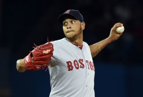 Jun 30, 2015; Toronto, Ontario, CAN; Boston Red Sox starting pitcher Eduardo Rodriguez (52) delivers a pitch against Toronto Blue Jays at Rogers Centre. Mandatory Credit: Dan Hamilton-USA TODAY Sports