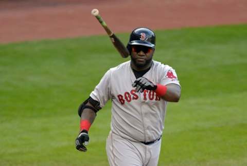 Oct 4, 2015; Cleveland, OH, USA; Boston Red Sox designated hitter David Ortiz (34) tosses his bat after walking in the sixth inning against the Cleveland Indians at Progressive Field. Mandatory Credit: David Richard-USA TODAY Sports