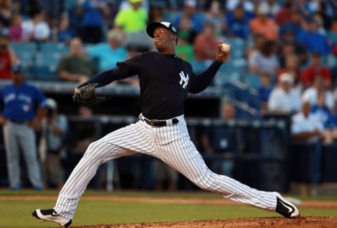 Mar 16, 2016; Tampa, FL, USA; New York Yankees relief pitcher Aroldis Chapman (54) throws a pitch during the fourth inning against the Toronto Blue Jays at George M. Steinbrenner Field. Mandatory Credit: Kim Klement-USA TODAY Sports