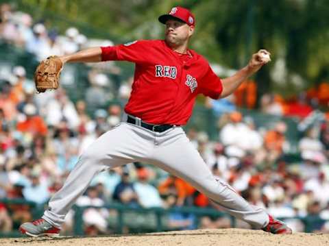 Mar 8, 2016; Sarasota, FL, USA; Boston Red Sox starting pitcher Brian Johnson (61) throws a pitch during the third inning against the Baltimore Orioles at Ed Smith Stadium. Mandatory Credit: Kim Klement-USA TODAY Sports