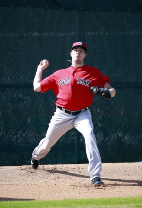 Feb 20, 2016; Lee County, FL, USA; Boston Red Sox relief pitcher Carson Smith (39) throws a bullpen session as he works out at Jet Blue Park. Mandatory Credit: Kim Klement-USA TODAY Sports