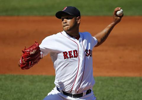 Sep 6, 2015; Boston, MA, USA; Boston Red Sox starting pitcher Eduardo Rodriguez (52) delivers against the Philadelphia Phillies during the first inning at Fenway Park. Mandatory Credit: Winslow Townson-USA TODAY Sports