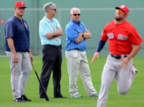 Feb 24, 2016; Lee County, FL, USA; From left Boston Red Sox manager John Farrell (53), Boston Red Sox president of baseball operations Dave Dombrowski and senior vice president of baseball operations Frank Wren watch the workout at Jet Blue Park. Mandatory Credit: Jonathan Dyer-USA TODAY Sports