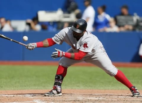 Sep 20, 2015; Toronto, Ontario, CAN; Boston Red Sox third baseman Pablo Sandoval (48) gets to first on a fielding error by Toronto Blue Jays pitcher Brett Cecil (not pictured) in the eighth inning at Rogers Centre. Boston defeated Toronto 4-3. Mandatory Credit: John E. Sokolowski-USA TODAY Sports