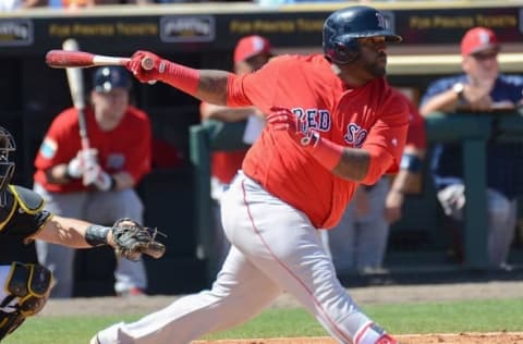 Mar 9, 2016; Bradenton, FL, USA; Boston Red Sox infielder Pablo Sandoval (48) hits a pop fly in the third inning of the spring training game against the Pittsburgh Pirates at McKechnie Field. Mandatory Credit: Jonathan Dyer-USA TODAY Sports