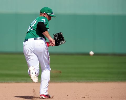 Mar 17, 2016; Fort Myers, FL, USA; Boston Red Sox third baseman Travis Shaw (47) fields a ground ball during the game against the Baltimore Orioles at JetBlue Park. The Boston Red Sox won 9-5. Mandatory Credit: Evan Habeeb-USA TODAY Sports