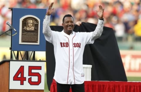 Jul 28, 2015; Boston, MA, USA; Hall of Fame player Pedro Martinez waves to the crowd during his number retirement ceremony before the game between the Chicago White Sox and the Boston Red Sox at Fenway Park. Mandatory Credit: Greg M. Cooper-USA TODAY Sports