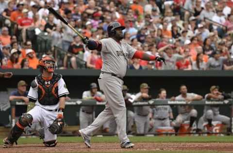 May 30, 2016; Baltimore, MD, USA; Boston Red Sox designated hitter David Ortiz (34) hits a solo home run during the eighth inning against the Baltimore Orioles at Oriole Park at Camden Yards. The Red Sox won 7-2. Mandatory Credit: Tommy Gilligan-USA TODAY Sports