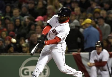 Apr 13, 2016; Boston, MA, USA; Boston Red Sox center fielder Jackie Bradley Jr. (25) hits a triple during the fourth inning against the Baltimore Orioles at Fenway Park. Mandatory Credit: Bob DeChiara-USA TODAY Sports