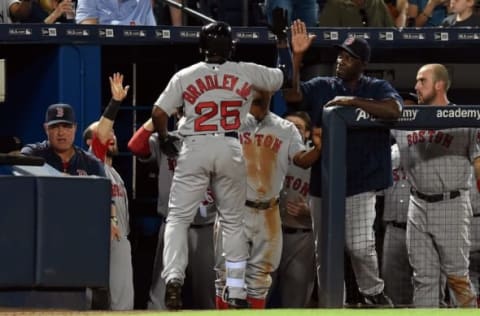 Apr 25, 2016; Atlanta, GA, USA; Boston Red Sox center fielder Jackie Bradley Jr. (25) gets high fives in the dugout after hitting a home run against the Atlanta Braves during the seventh inning at Turner Field. Mandatory Credit: Dale Zanine-USA TODAY Sports