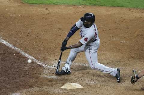 Apr 24, 2016; Houston, TX, USA; Boston Red Sox center fielder Jackie Bradley Jr. (25) drives in a run with a single during the twelfth inning against the Houston Astros at Minute Maid Park. Mandatory Credit: Troy Taormina-USA TODAY Sports