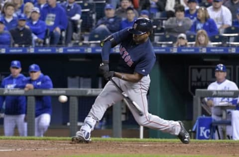 May 18, 2016; Kansas City, MO, USA; Boston Red Sox center fielder Jackie Bradley Jr. (25) connects for a single in the eight inning against the Kansas City Royals at Kauffman Stadium. Boston won 5-2. Mandatory Credit: Denny Medley-USA TODAY Sports