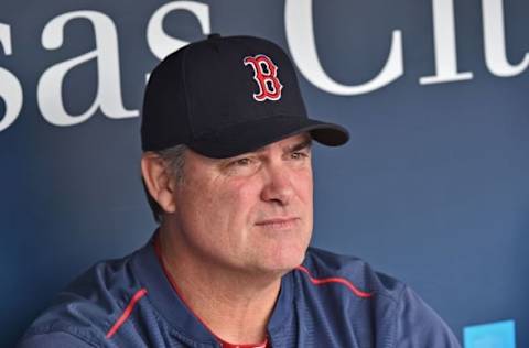 May 18, 2016; Kansas City, MO, USA; Boston Red Sox manager John Farrell (53) looks out from the dugout while talking with the media prior to a game against the Kansas City Royals at Kauffman Stadium. Mandatory Credit: Peter G. Aiken-USA TODAY Sports