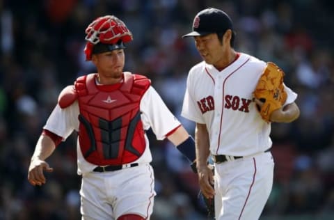 May 22, 2016; Boston, MA, USA; Boston Red Sox catcher Christian Vazquez (7) talks with pitcher Koji Uehara (19) during the eighth inning against the Cleveland Indians at Fenway Park. Mandatory Credit: Greg M. Cooper-USA TODAY Sports