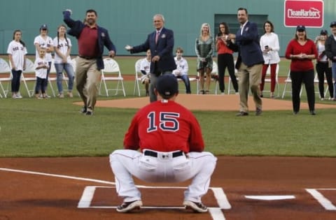 May 20, 2016; Boston, MA, USA; 2016 Red Sox Hall of Fame inductees (L to R) Jason Varitek, Larry Lucchino and Tim Wakefield throw out the first pitch before the start of the game against the Cleveland Indians at Fenway Park. Mandatory Credit: David Butler II-USA TODAY Sports