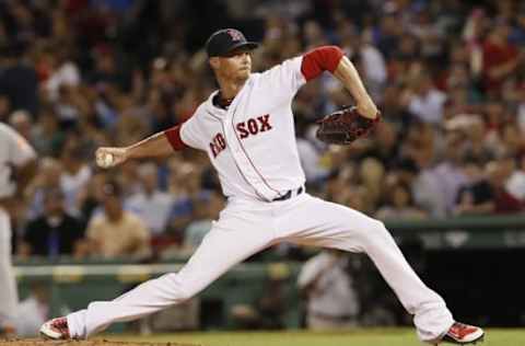 Jun 16, 2016; Boston, MA, USA; Boston Red Sox pitcher Clay Buchholz (11) throws a pitch against the Baltimore Orioles in the seventh inning at Fenway Park. Mandatory Credit: David Butler II-USA TODAY Sports