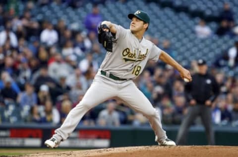 May 23, 2016; Seattle, WA, USA; Oakland Athletics starting pitcher Rich Hill (18) throws against the Seattle Mariners during the second inning at Safeco Field. Mandatory Credit: Joe Nicholson-USA TODAY Sports