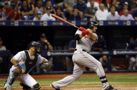 Jun 28, 2016; St. Petersburg, FL, USA; Boston Red Sox third baseman Travis Shaw (47) hits a 2-RBI double during the seventh inning against the Tampa Bay Rays at Tropicana Field. Mandatory Credit: Kim Klement-USA TODAY Sports