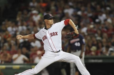 Jul 23, 2016; Boston, MA, USA; Boston Red Sox relief pitcher Clay Buchholz (11) pitches during the sixth inning against the Minnesota Twins at Fenway Park. Mandatory Credit: Bob DeChiara-USA TODAY Sports